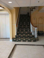 Main Lobby with staircase and elevator